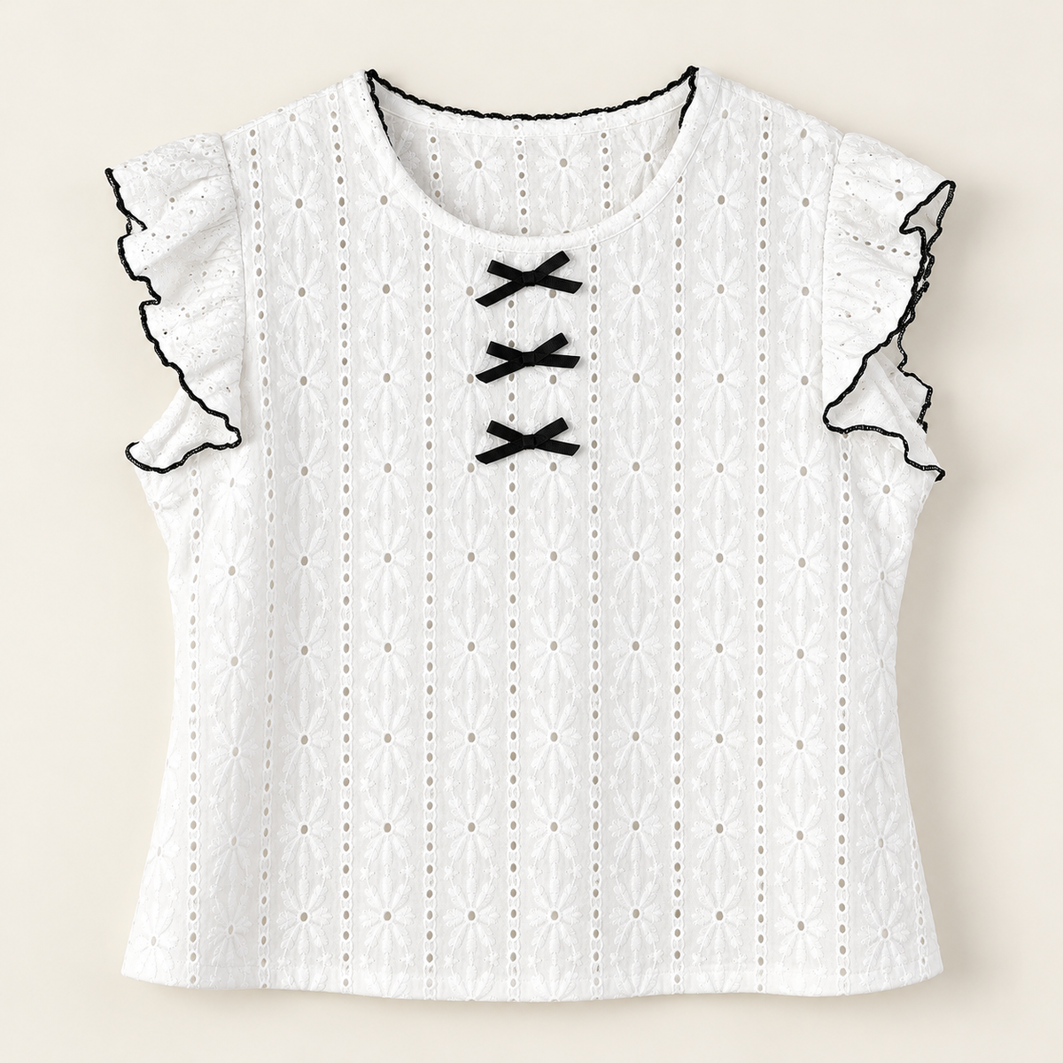 Pijama blanco de dos piezas con lazos negros — D1
