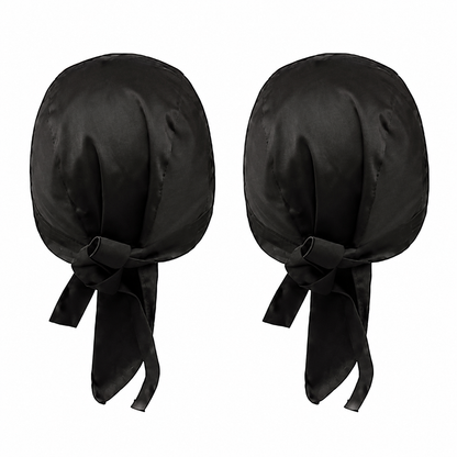 Dos gorros negros completos con tiras para anudar.
